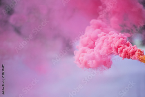 Pink Smoke Bomb in the air photo