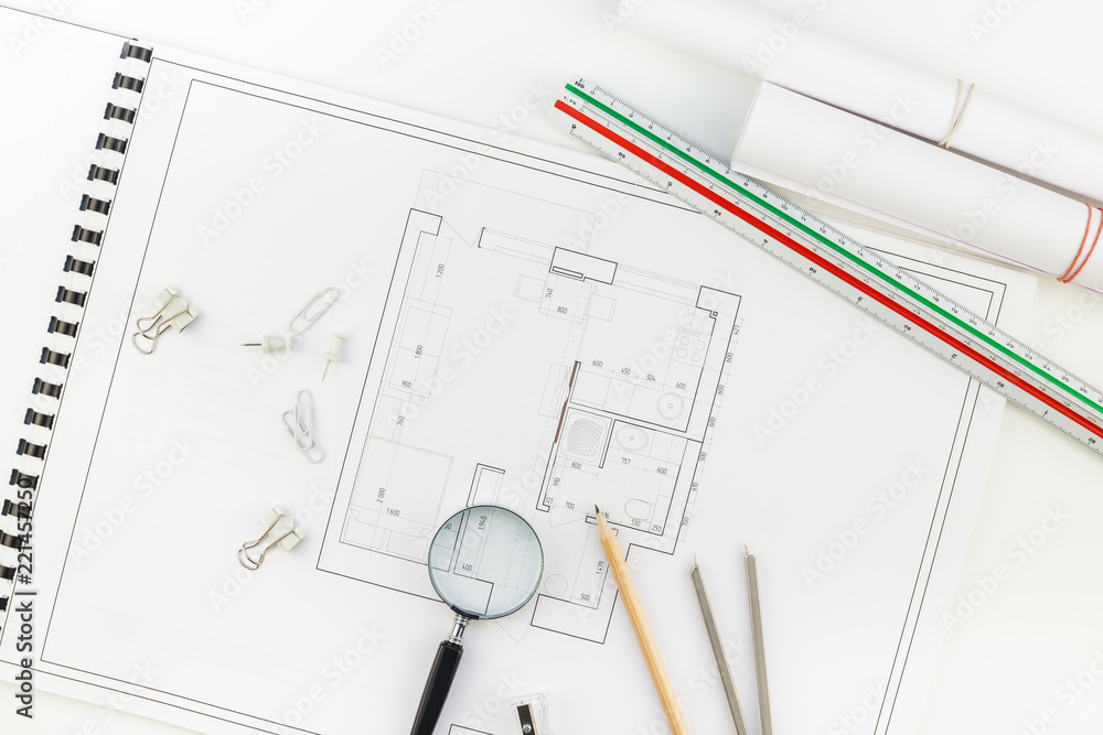 Interior designer table workplace with house plan Interior designer table workplace with house plan