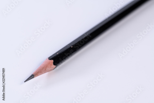 Single isolated black lead graphite pencil with a white background