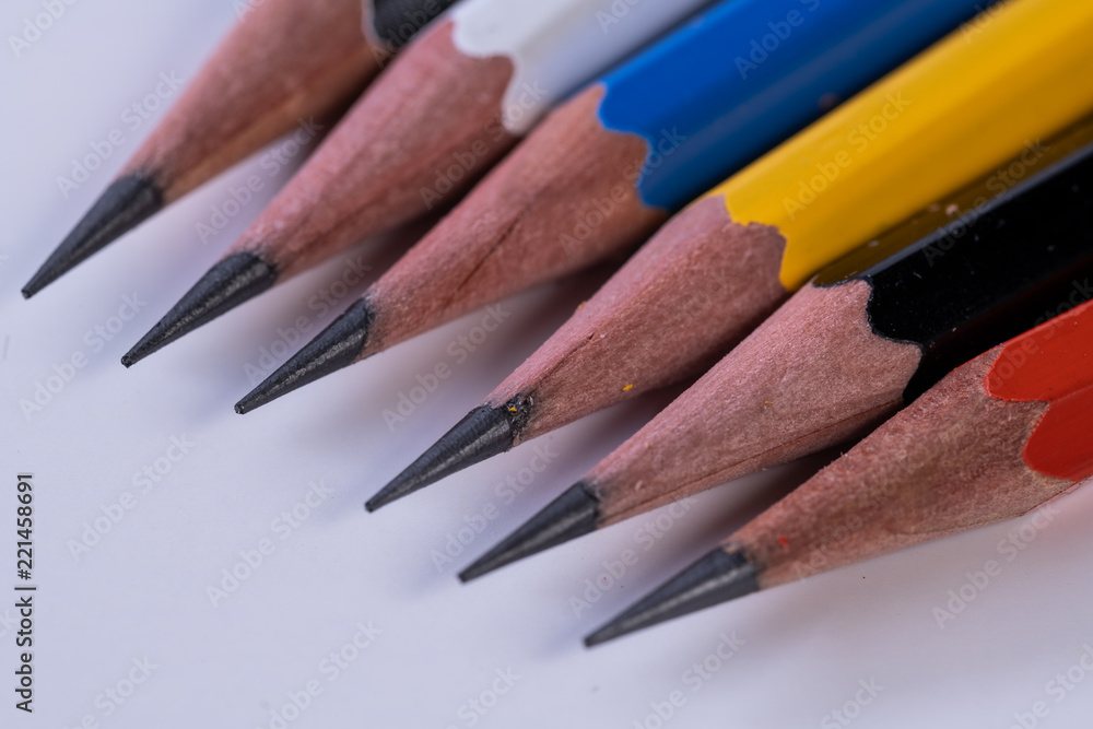 Several sharp new lead graphite pencils of various colors and patterns Several sharp new lead graphite pencils of various colors and patterns