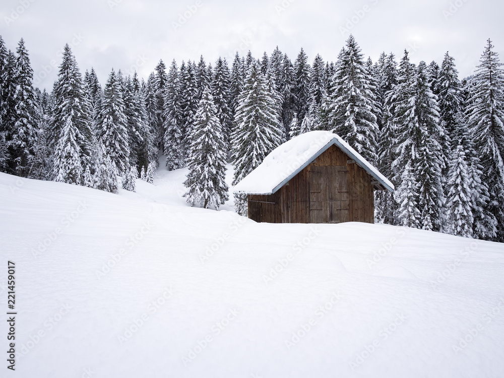 Drying-frame in snowy mountain landscape Drying-frame in snowy mountain landscape