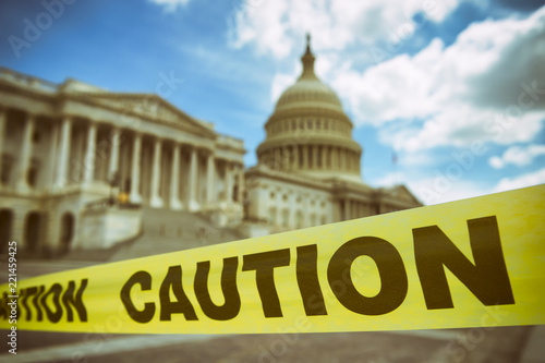 Caution tape running across the front of the US Capitol Building in Washington DC