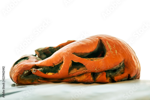 Fotografie rotten pumpkin Jack lantern for Halloween isolated on white background
