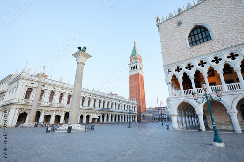 Saint Mark bell tower, National Marciana library and Doge palace view, nobody in the early morning in Venice, Italy © andersphoto