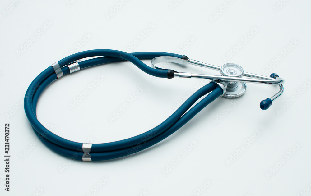 Stethoscope in blue Isolated on white. Detailed image of medical instrument. Stethoscope in blue Isolated on white. Detailed image of medical instrument.