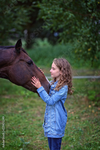 young girl with a horse