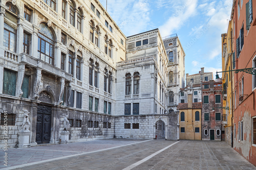 Venice, empty square or campo with ancient buildings in a sunny summer day in Italy