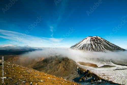 Fototapeta Naklejka Na Ścianę i Meble -  Scenic view of surreal volcanic mountains landscape and natural wonder of UNESCO Heritage with the top of Mt Ngauruhoe the active volcano, lakes and craters Tongariro National Park, New Zealand