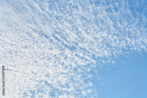 Beautiful clouds on a blue sky background.
