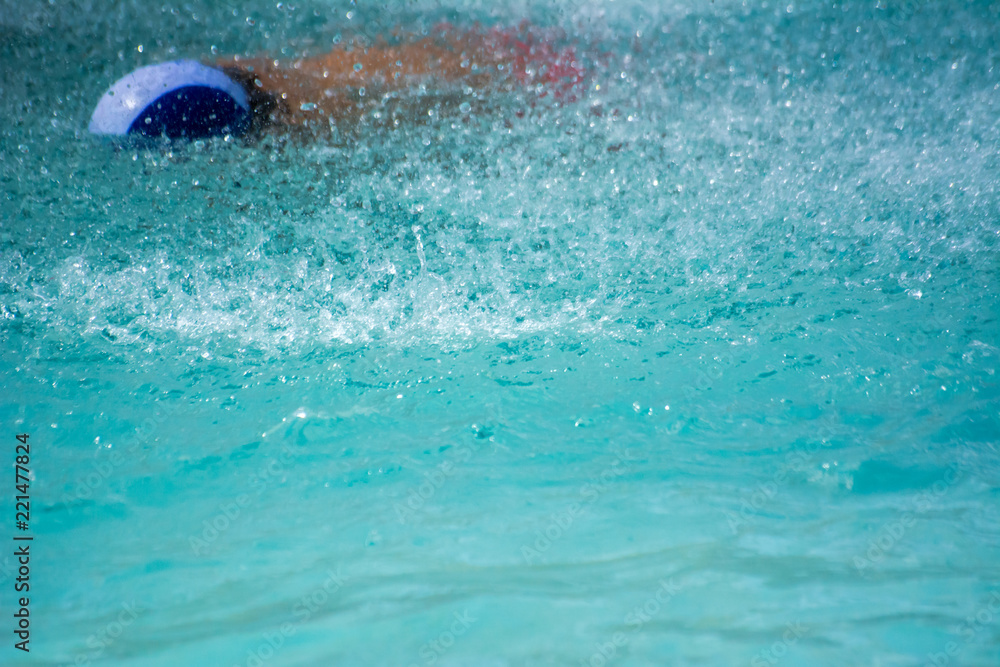 Close Up of a Child Diving in the Swimming Pool