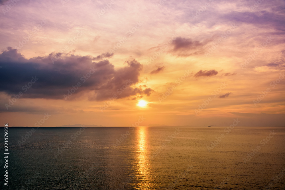Beautiful natural landscape of orange sky sun and sea during sunset at the coast of Koh Samui island, Surat Thani, Thailand