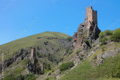 Aerial view from the drone. Mountain Ingushetia, medieval tower complex Vovnushki-stone towers standing on the rocks. © frolova_elena
