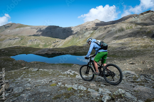 Fototapeta Naklejka Na Ścianę i Meble -  mountainbiker in action in the beautiful aosta valley, Italy, Europe