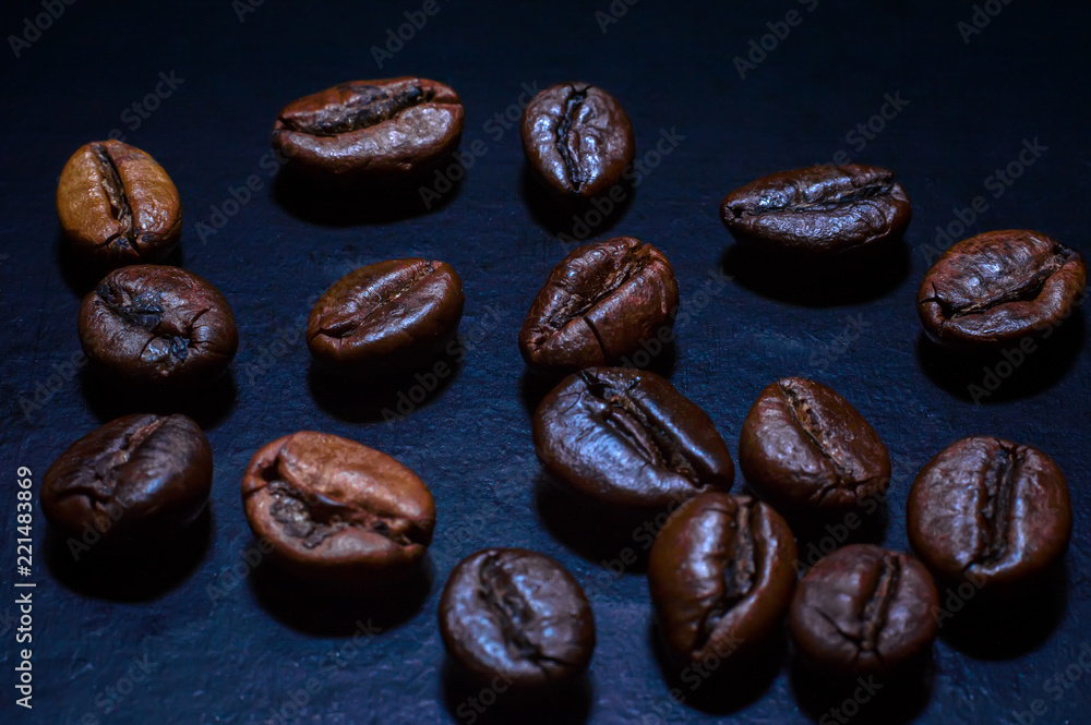 Coffee beans on a dark background. Coffee beans on a dark background.