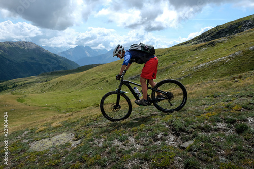 mountainbiker in action in the beautiful aosta valley, Italy, Europe © Erich 