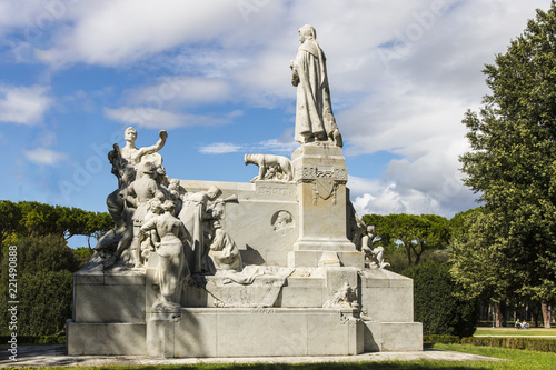 Marble statue of poet Francesco Petrarca near Medici fortress in Arezzo,Tuscany, Italy photo