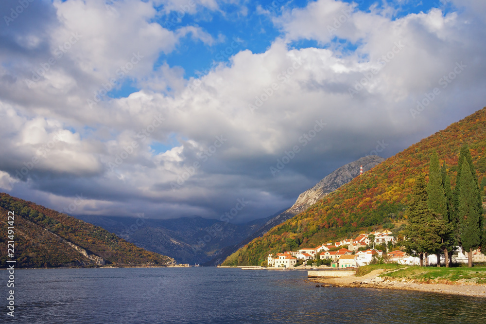 Beautiful Mediterranean landscape on sunny autumn day. Montenegro,  Bay of Kotor, Verige Strait, Lepetane village