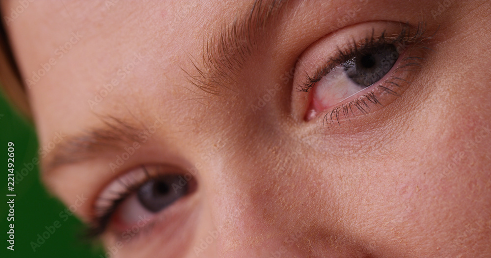 © Mark Adams - Close up of Caucasian woman's blue eyes looking at camera on green screen © Mark Adams - Close up of Caucasian woman's blue eyes looking at camera on green screen