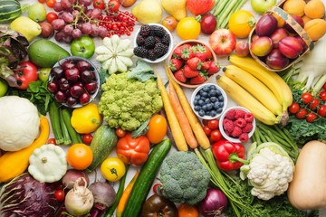 Healthy fruits vegetables berries background, cherries peaches strawberries cabbage broccoli cauliflower squash tomatoes carrots bananas beans beetroot, pepper, top view, selective focus