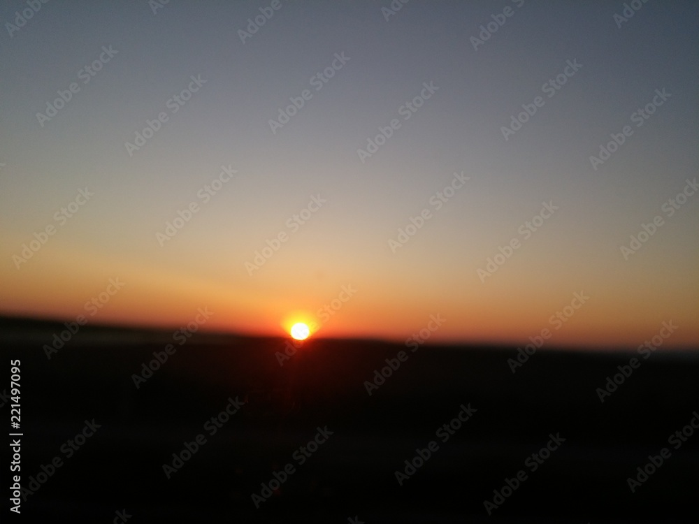 Minimalist clear sky sunset, moody, defocused with copy space Minimalist clear sky sunset, moody, defocused with copy space