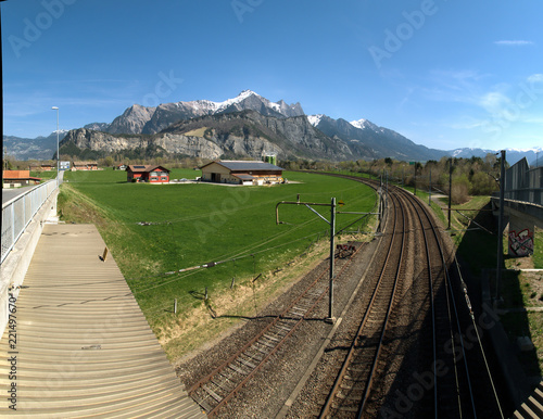 View over the railway line to Falknis, Swiss Rhine valley near Sargans photo