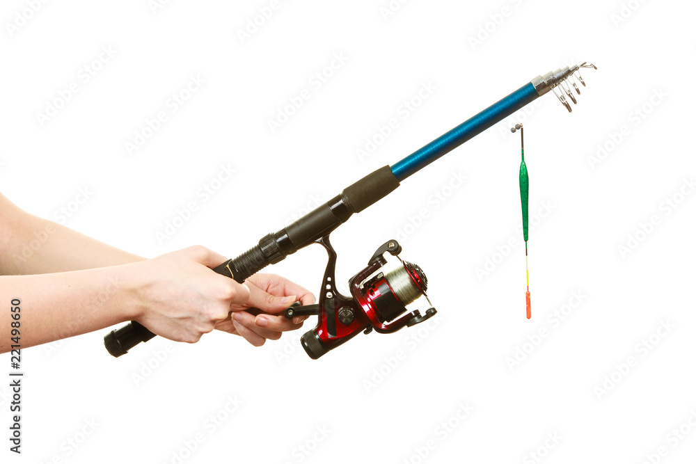 Person holding fishing rod, spinning equipment. Person holding fishing rod, spinning equipment.