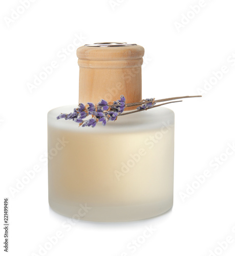 Fototapeta Naklejka Na Ścianę i Meble -  Bottle with aromatic lavender oil on white background