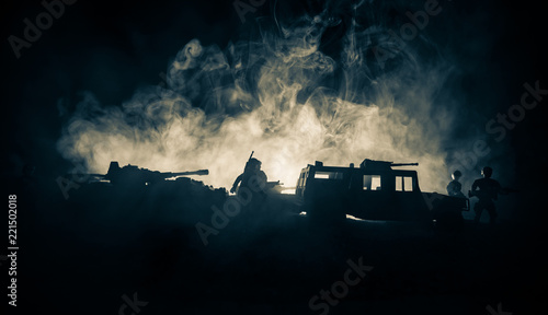 War Concept. Military silhouettes fighting scene on war fog sky background, World War Soldiers Silhouettes Below Cloudy Skyline At night. Attack scene. Army jeep vehicles with soldiers. army jeep