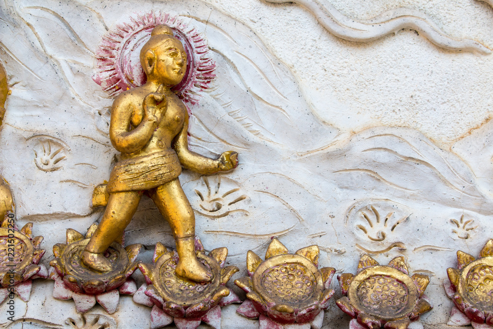 Thai style cement carving art on temple wall  in Wat Chai Mongkon - Buddhist Temple , Chiang Mai Thailand