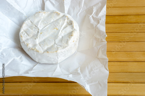 Camembert cheese on a white wrapper