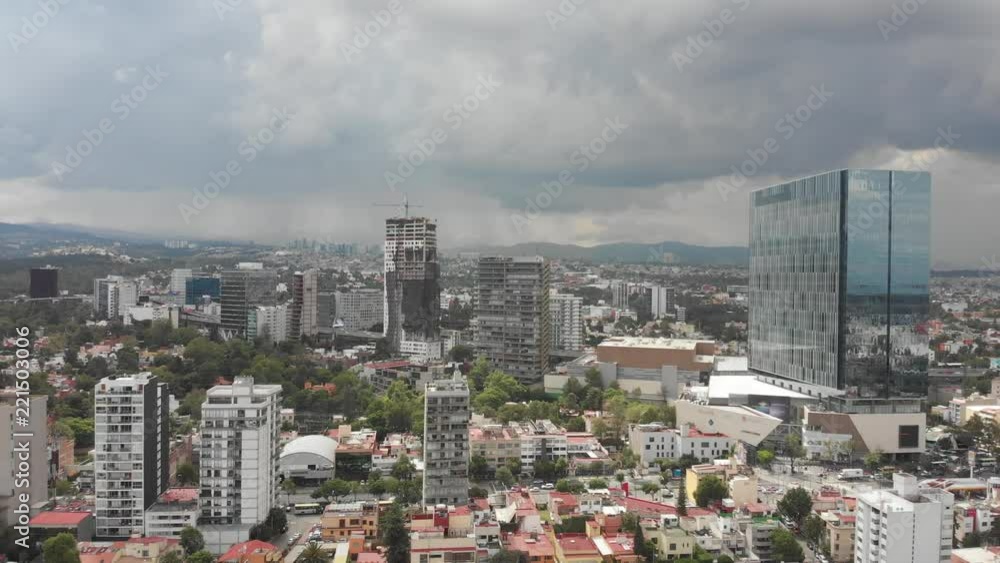 Aerial panoramic view of Mexico City with views of Santa Fe in a clear and cloudy day. Aerial panoramic view of Mexico City with views of Santa Fe in a clear and cloudy day.