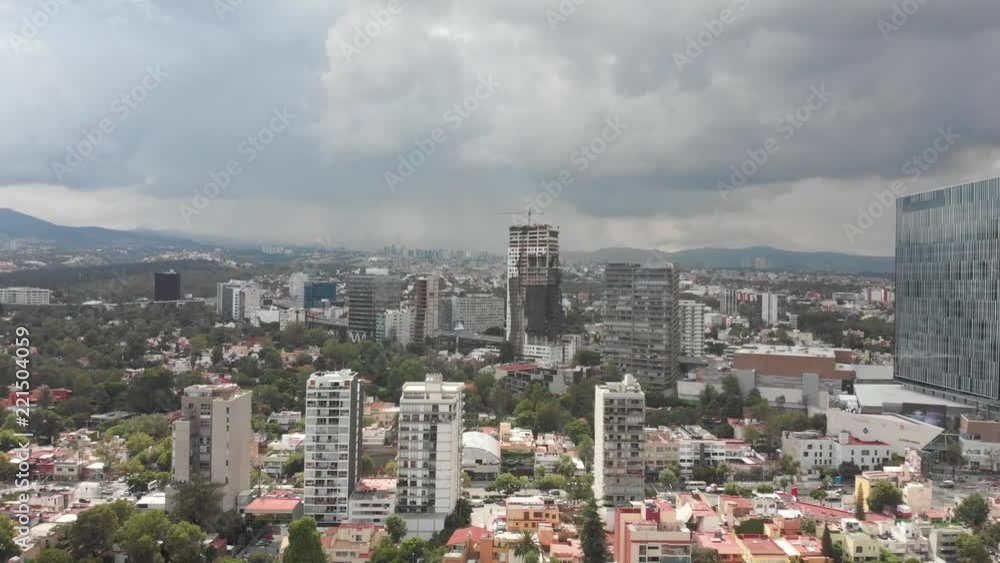 Aerial panoramic view of Mexico City with views of Santa Fe in a clear and cloudy day. Aerial panoramic view of Mexico City with views of Santa Fe in a clear and cloudy day.