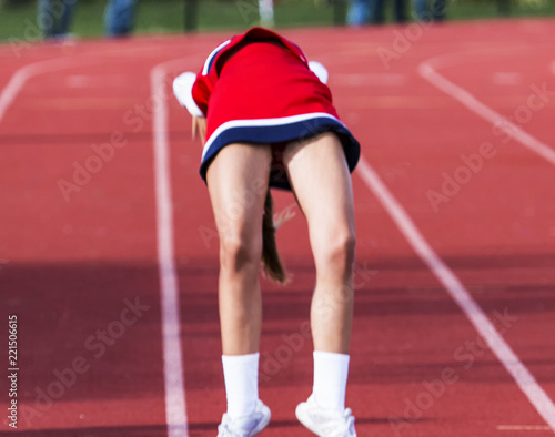 Cheerleader doing a back flip