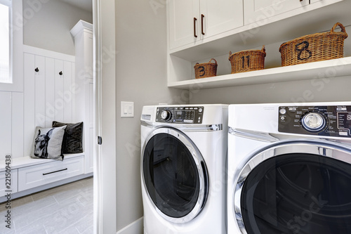 White clean laundry modern room with washer and dryer