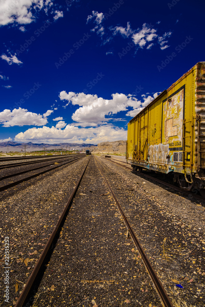 Fototapeta premium Old rusted freight train on railroad tracks.