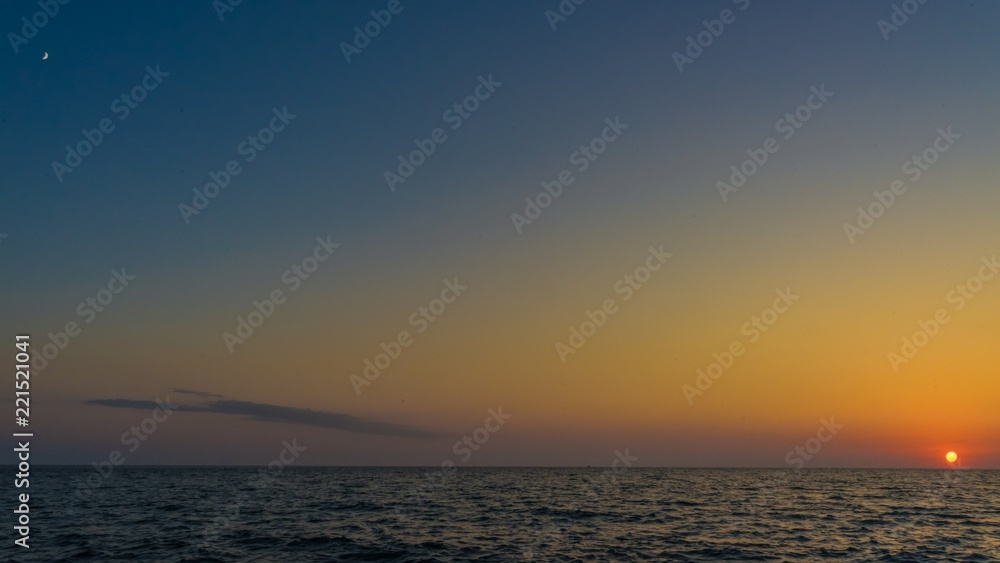 View of Sun and Moon on the Black Sea, Sunset in Sochi