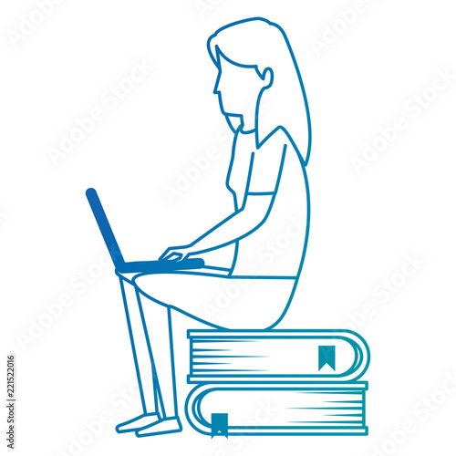 young woman working with laptop in books