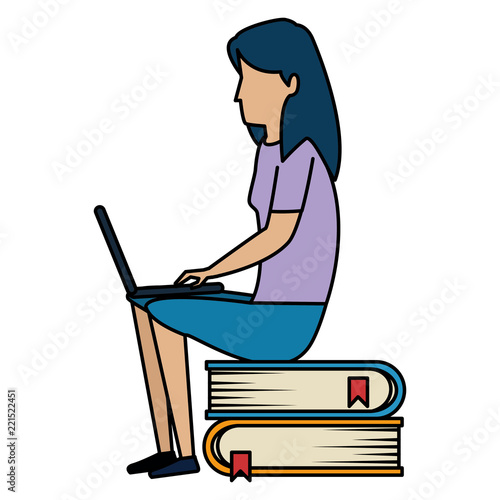 young woman working with laptop in books