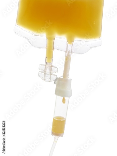 IV bag with orange juice photo