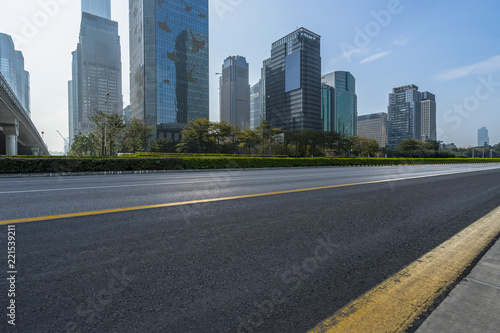 empty urban road with modern city skyline in china © hallojulie