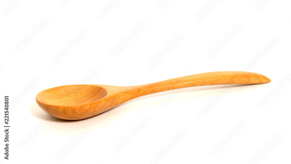 Wooden spoon on white background. Composition isolated over the white background. Wooden spoon on white background. Composition isolated over the white background.