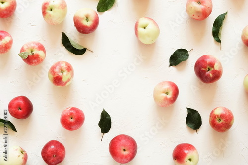 Red apples pattern on white vintage background.Top view.Copy space. flat lay