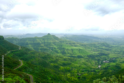 Beautiful landscape aerial, and closeup Photos of nature, roads, grass, trees, village, and farm land. Lush green monsoon nature mountains, hills, Purandar fort, Pune, Maharashtra, India