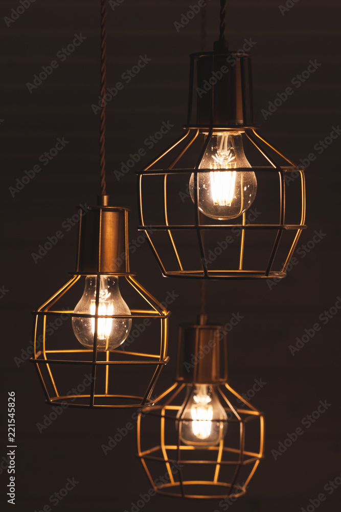 Chandelier with hanging three bulb lamps