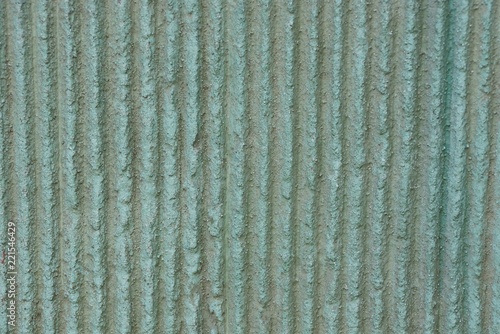 gray green stone texture from a striped concrete wall
