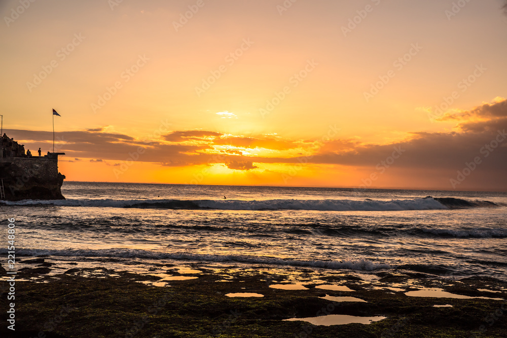 Beautiful golden sunset over the beach and ocean