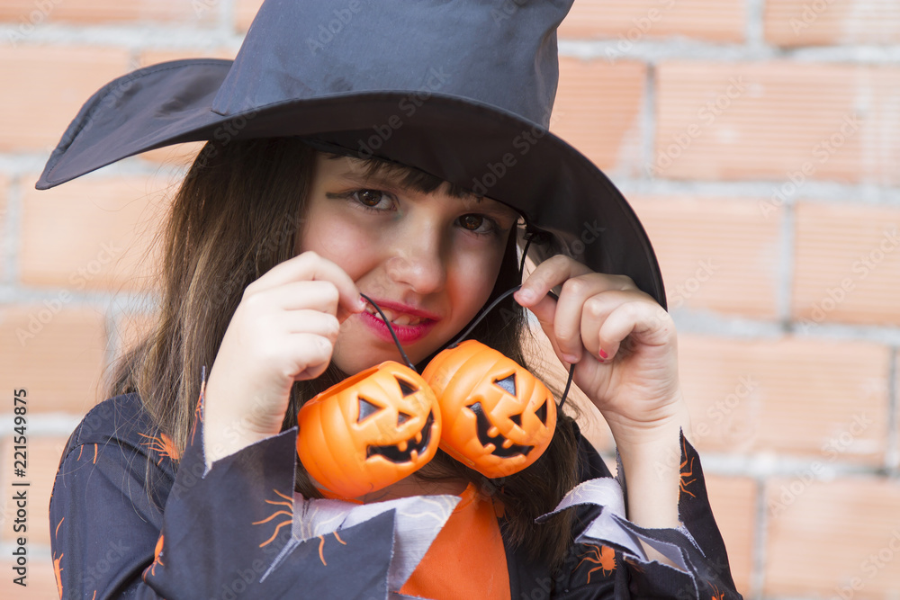 portrait of witch with pumpkin, halloween party portrait of witch with pumpkin, halloween party