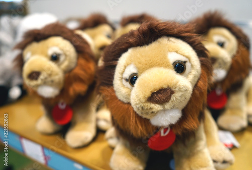 Soft toys lion cubs for children on the counter of the store. © Valemaxxx