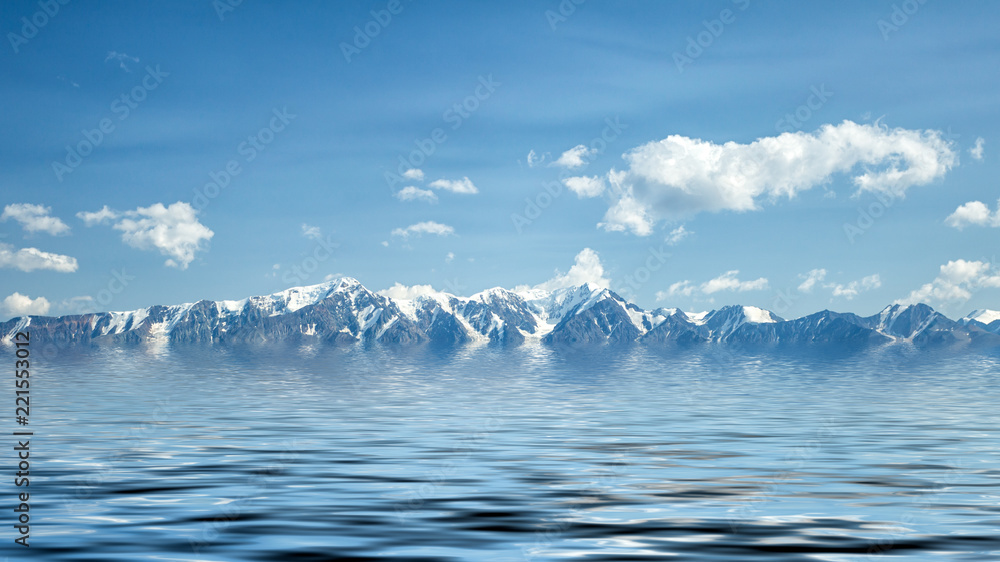 A landscape view of beautiful fhigh mountains covered with ice and snow, in the foreground the cold blue sea.
