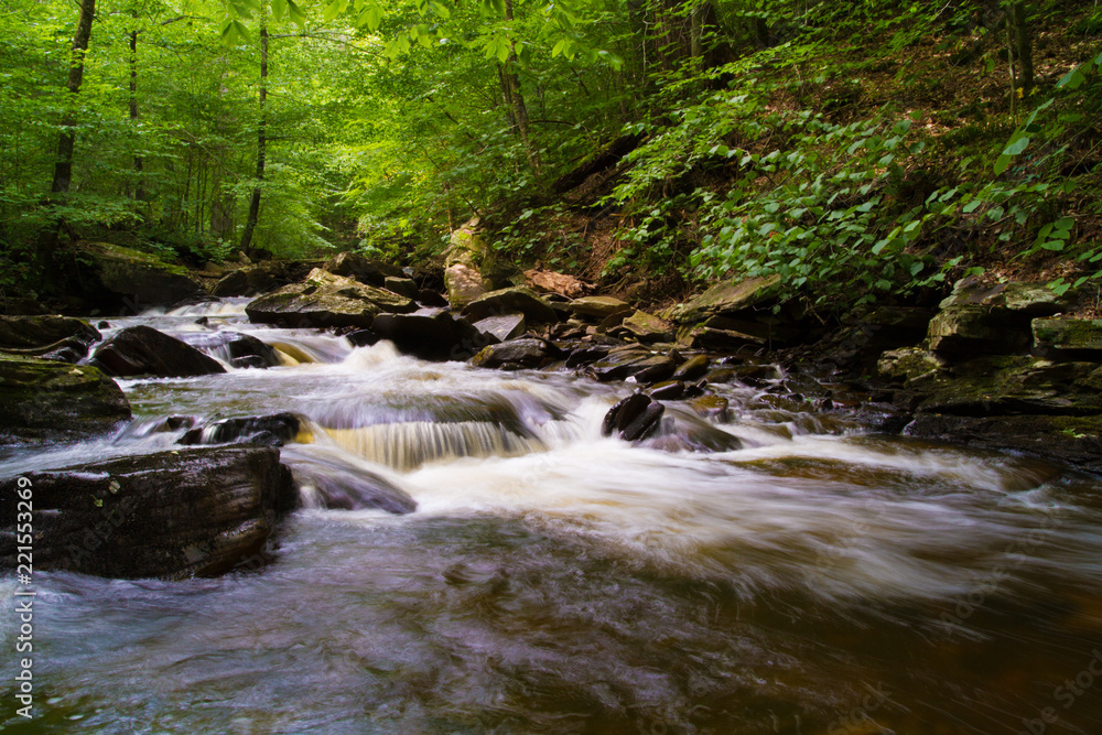 Waterfall Flowing Through Timberland In Pennsylvania Gorge Waterfall Flowing Through Timberland In Pennsylvania Gorge